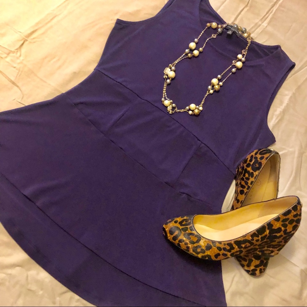 SOLD Purple peplum top